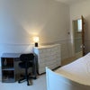 Photo 2: Double bedroom from bathroom hallway