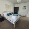 Photo 2: 1st bedroom available at the front of the house