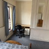 Photo 4: Desk, chair and closed storage cupboard