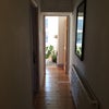 Photo 8: hallway leading to bathroom and garden bedroom 