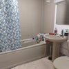 Photo 8: Bathroom - shower head behind curtain
