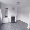 Photo 1: Living room unfurnished