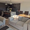Photo 6: Kitchen island and lounge area