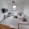 Photo 8: living room with Canary Wharf view