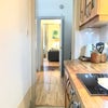 Photo 7: Kitchen through the apartment 