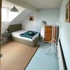 Photo 1: Room 1 - ensuite room, bed and clothing storage
