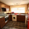 Photo 2: Kitchen area