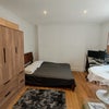 Photo 2:  Big oak wardrobe with drawers plus a proper double bed – loads of storage