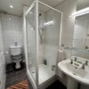 Photo 4: Shared bathroom with shower, WC and basin