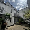 Photo 1: Outdoor Mews Patio Looking at House