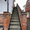 Photo 6: Staircase to fromt door