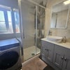 Photo 4: Shower and washing machine