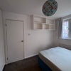 Photo 5: Double bed and adjacent bathroom