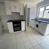 Photo 2: Living area with kitchen 