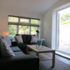 Photo 5: Spacious lounge / patio doors to garden