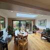 Photo 2: The doors fully fold away into a nice space that opens to the garden
