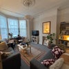 Photo 6: A warm and inviting shared living space, filled with natural light, plants and space to unwind