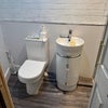 Photo 3: Toilet and hand basin 