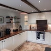 Photo 7: Kitchen with washer, fridge and freezer
