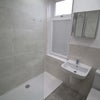 Photo 10: Shared Bathroom