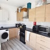 Photo 6: Lareg shared kitchen
