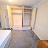 Photo 5: Spacious bedroom with large window and wardrobe