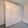 Photo 6: Fitted wardrobe x 4 / Hanging rail and shelves 