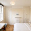 Photo 2: Additional built-in storage cupboards
