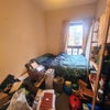 Photo 5: 2nd bedroom you would also have use of (current flatmate uses as a storage room)