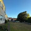 Photo 6: Front green space and parking