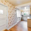 Photo 4: Spacious kitchen with back garden access and safe cupboard for each resident 