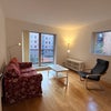 Photo 9: Bright living room with a private balcony
