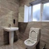 Photo 10: Downstairs Bathroom