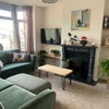 Photo 7: Front room 