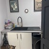 Photo 8: Utility room washer dryer hanging area