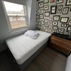 Photo 8: Small double room / storage bed / chest of drawers / wall mounted hanging rail