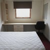 Photo 2: Picture of furnished bedroom.