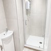 Photo 7: shower downstairs