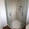 Photo 4: Shower in shared bathroom 