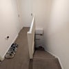 Photo 9: Stairs Outside Bedroom