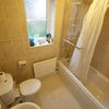 Photo 6: First floor shared bathroom