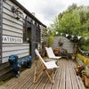 Photo 6: Shared deck above the river