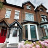Photo 3: Front of property