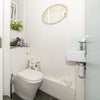 Photo 7: Downstairs half bathroom