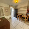 Photo 6: Dining room refrigerator 