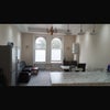 Photo 2: The living/dining/kitchen
