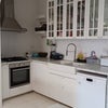 Photo 5: The kitchen