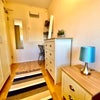 Photo 2: ample storage n own tv