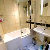 Photo 3:  adjacent bathroom shared with just 1 other adjacent bathroom shared with just 1 other
