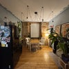 Photo 4: The lounge / open plan kitchen